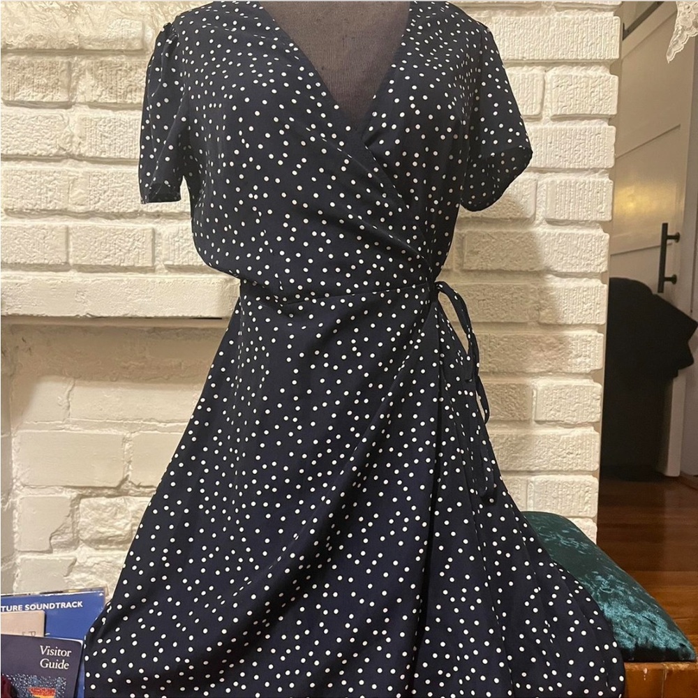 Short polka dotted cute dress that ties at the waist!